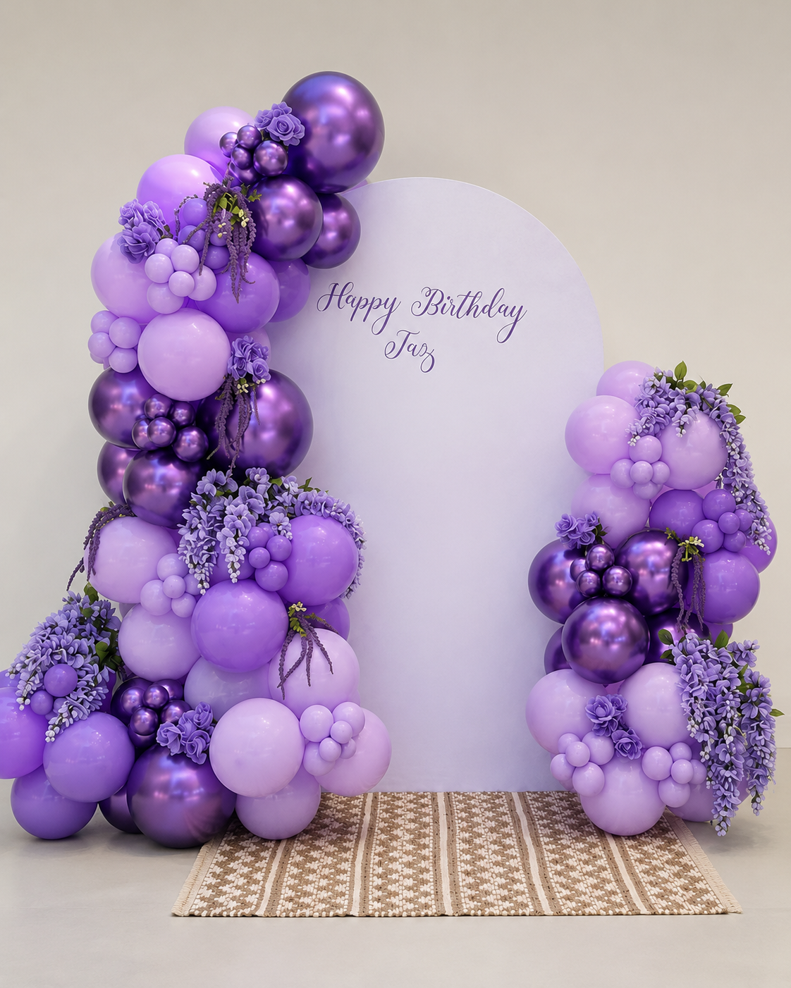 Purple floral arch · Taz